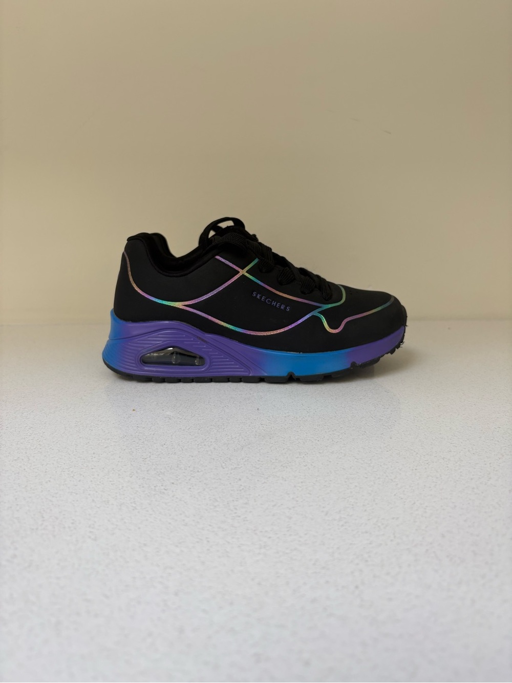 Skechers Kids Black Sneakers with Iridescent Rainbow Trim and Blue-Purple Sole